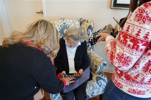 Nursing home resident receives a pair of socks